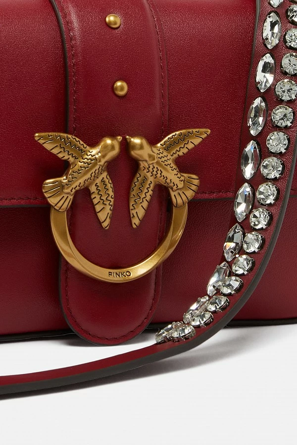 Bolso Mini Love Bag Slouchy de piel suave con charms – Pinko