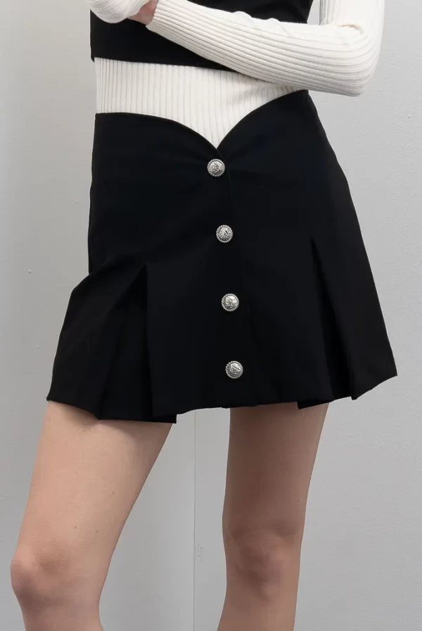 mini falda negra tablas botones plata