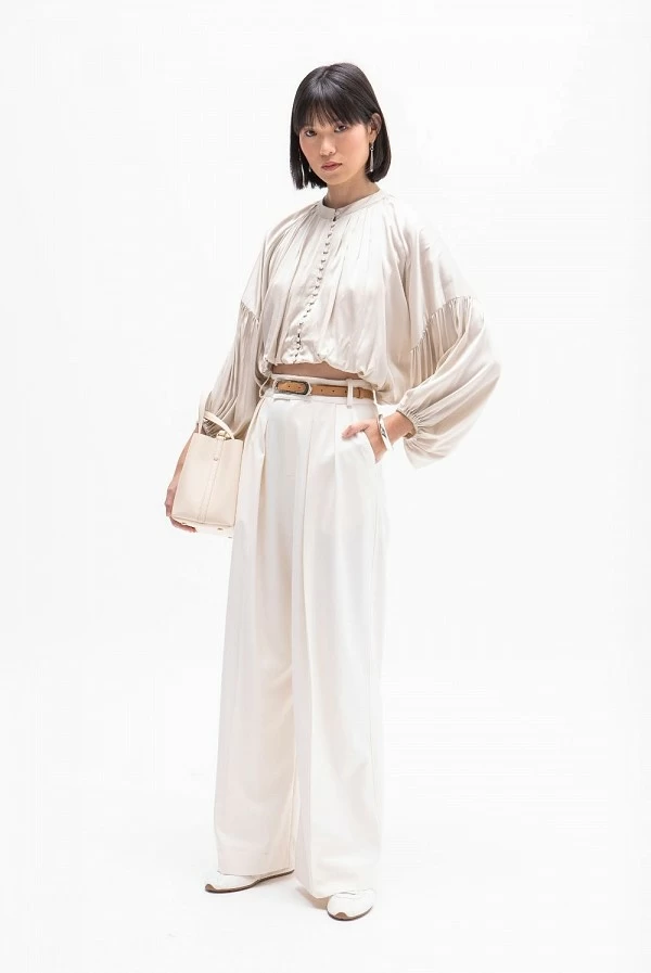 Pantalón beige claro de tiro alto y corte ancho masavi