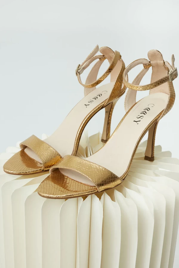 Sandalia Coosy tacon oro