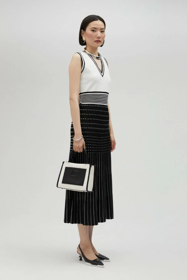 Vestido midi bicolor de punto con efecto plisado lola casademunt